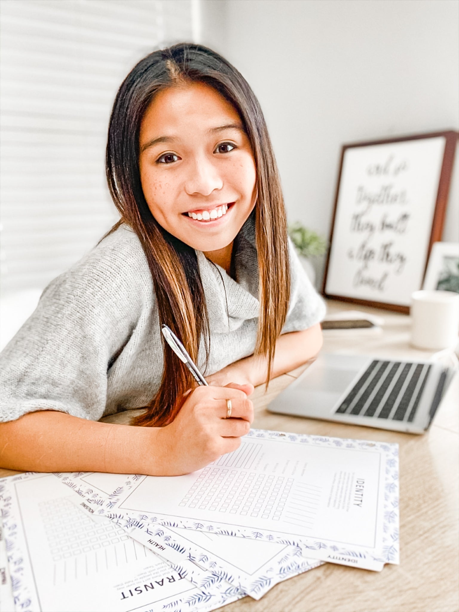 Woman working on PCS binder set